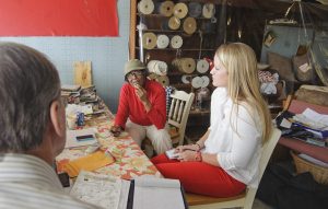 Mollie Mansfield interviews civil rights activist and business owner Vernice Sanders with Professor Bill Rose at Vernice's Upholstery in Leland, Miss., Tuesday, March 11, 2014. (Photo/Thomas Graning)